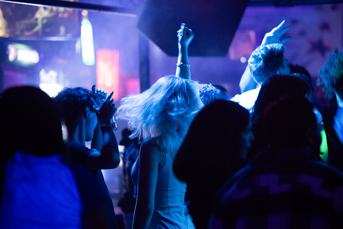 Crowd at club with lights by Andrea Polk