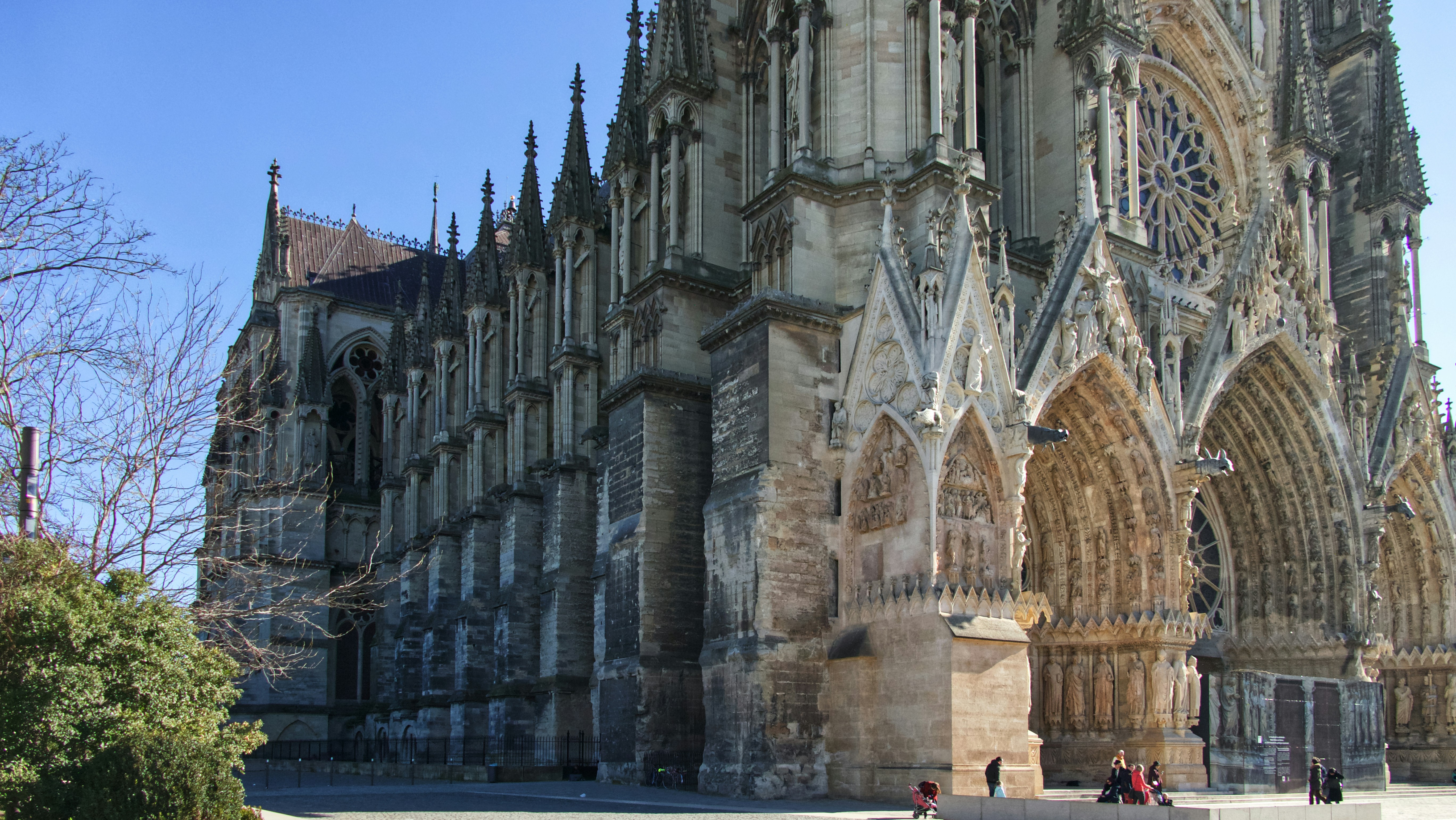 Reims Cathedral glowing over the winter market square