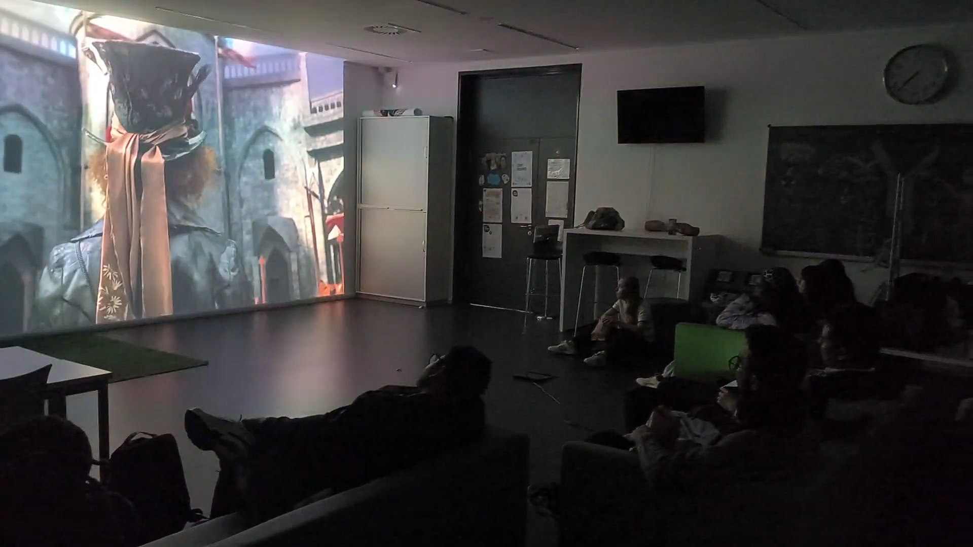 Students at a Study and Chill Lounge movie night and campus community event